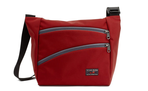 Icon in Mars Red 525 Ballistic with Northwest Sky (light grey) zippers.